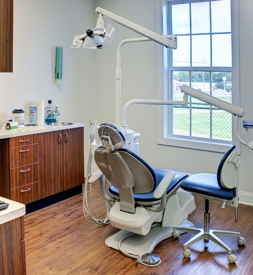 Well-equipped dental exam room, ready for patient care, representing the quality practices involved in transitions.