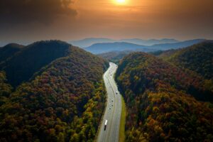 Scenic view of I-40 cutting through the Appalachian Mountains near Asheville, NC, representing the pathways Legacy Practice Transitions creates for dental practice transitions.